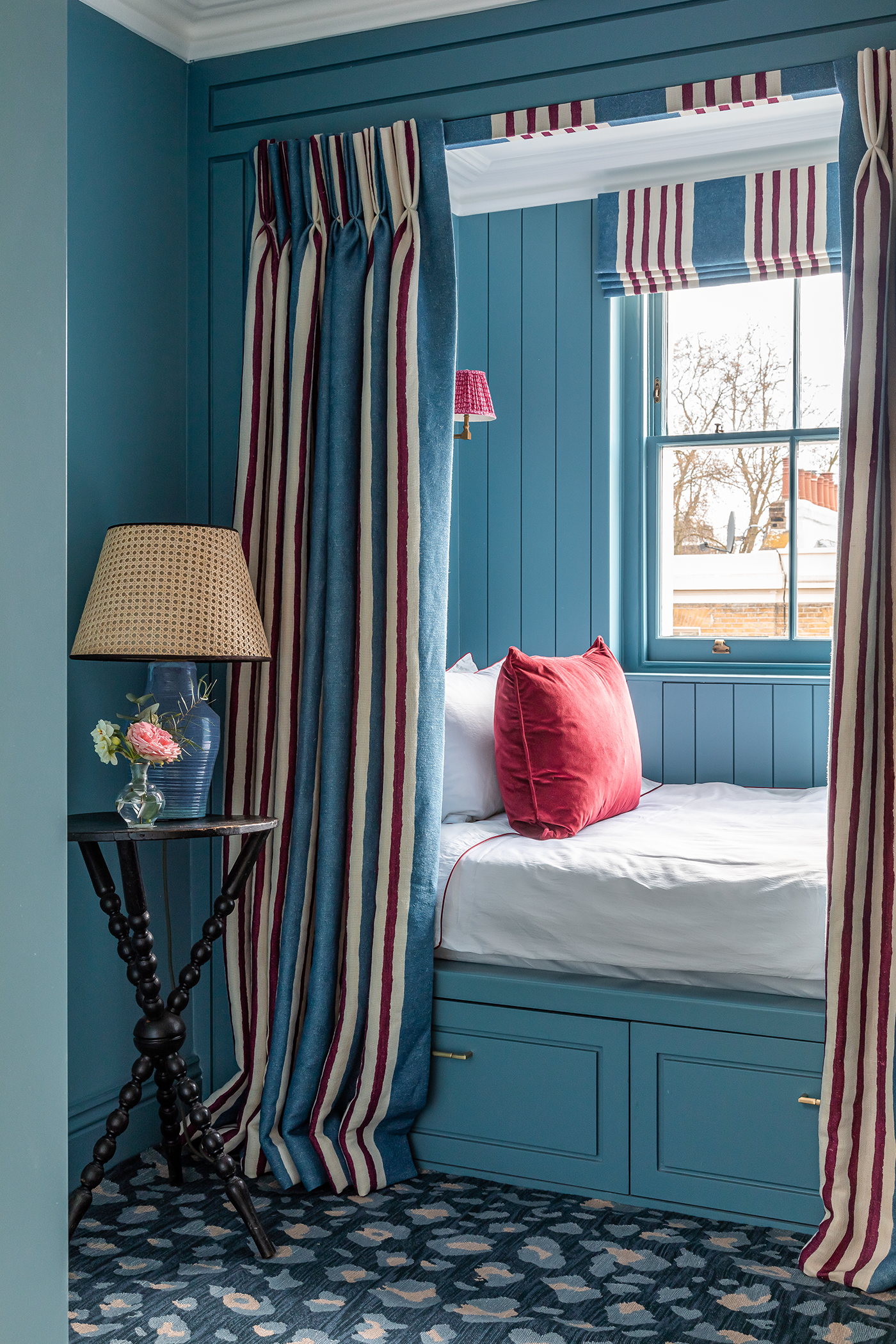 blue window seat style bed
