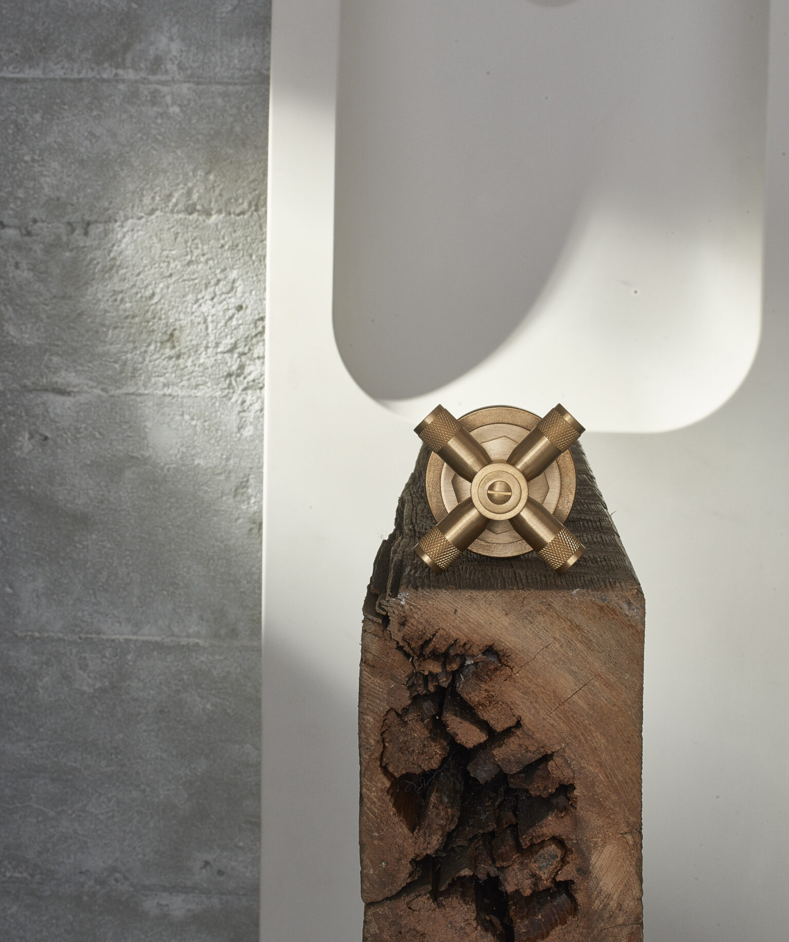 samuel heath LMK industrial bauhaus inspired cross top tap handle in a natural urban brass finish.