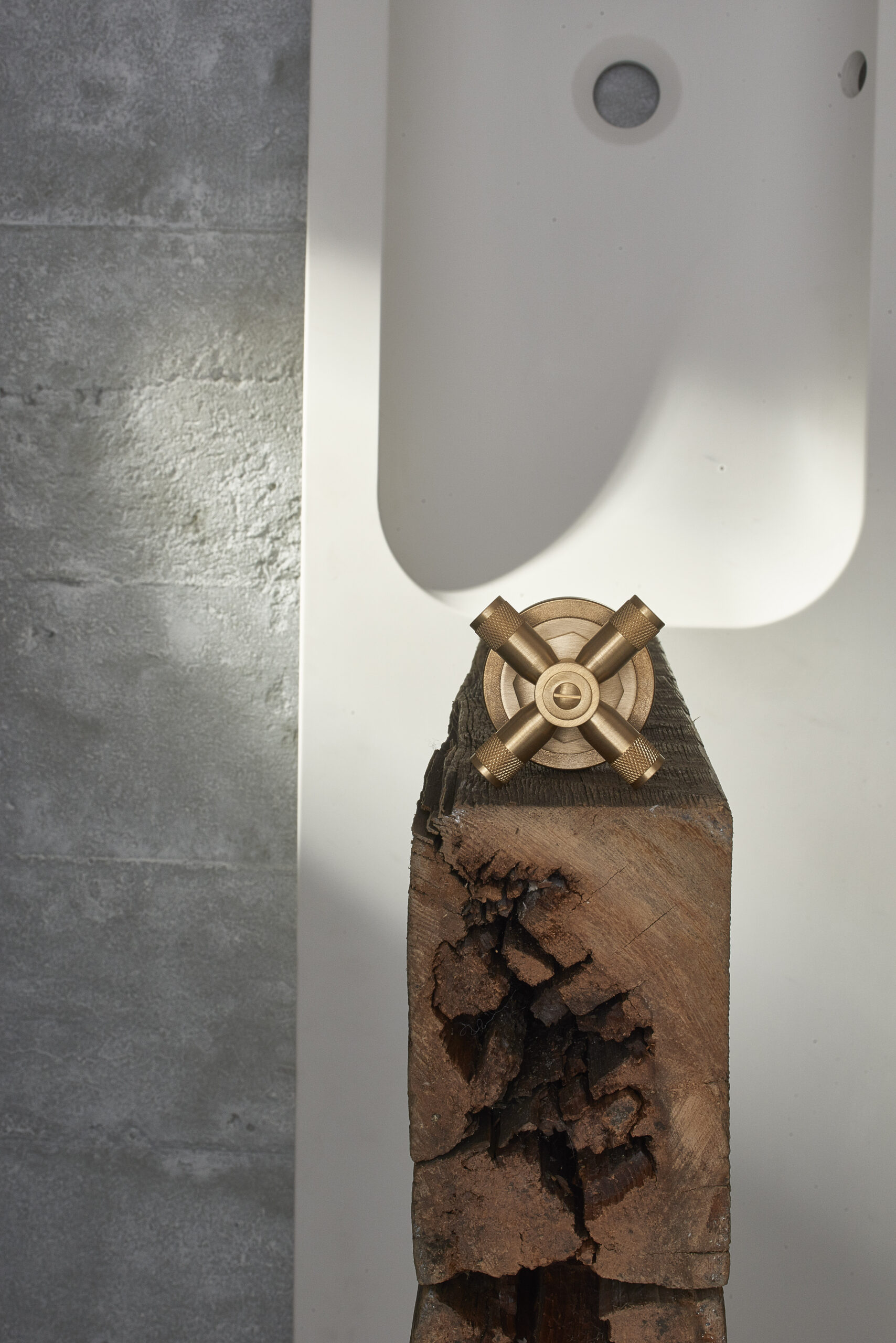 samuel heath LMK industrial bauhaus inspired cross top tap handle in a natural urban brass finish.